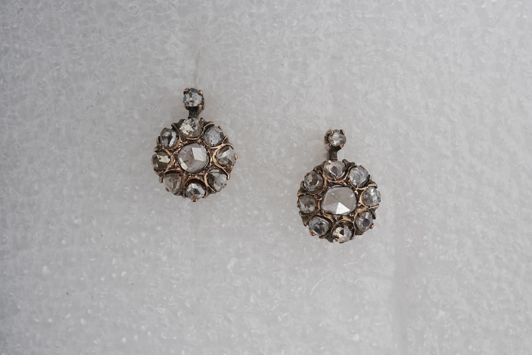 A pair of diamond earrings